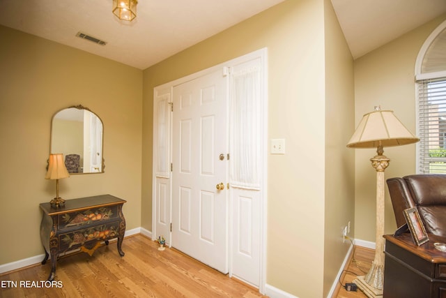 foyer entrance featuring light hardwood / wood-style flooring