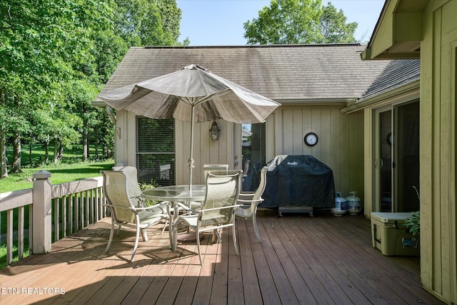 wooden terrace featuring area for grilling