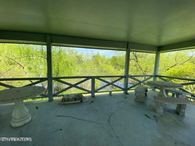 unfurnished sunroom with a healthy amount of sunlight