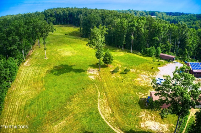 birds eye view of property featuring a rural view