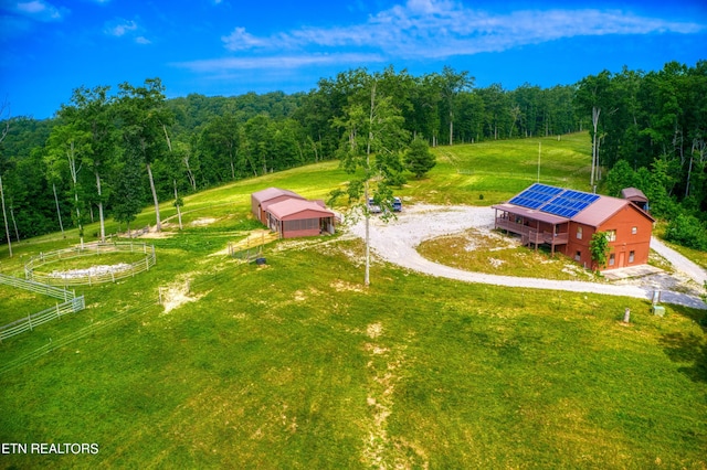 birds eye view of property featuring a rural view