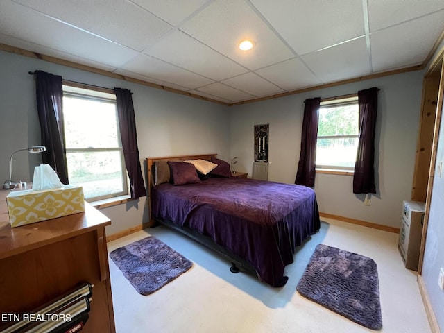 bedroom featuring a paneled ceiling