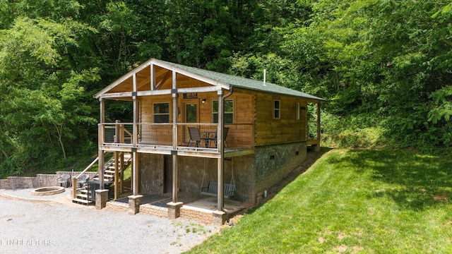 view of outdoor structure featuring a yard