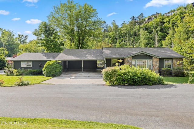 ranch-style house with a carport