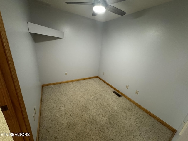 unfurnished room featuring carpet floors and ceiling fan