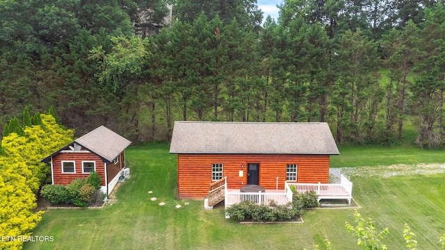 exterior space with a yard