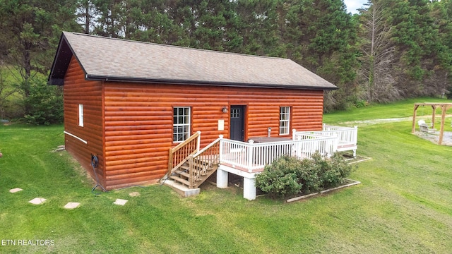 view of outbuilding with a lawn