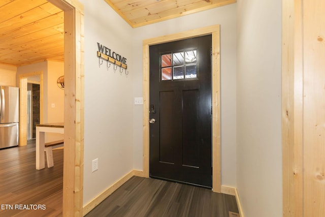 foyer entrance with wood ceiling and dark wood-type flooring