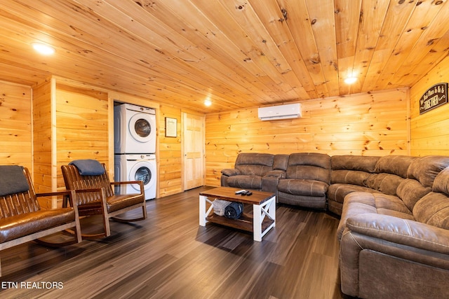 living room with a wall mounted air conditioner, wood walls, wooden ceiling, dark wood-type flooring, and stacked washer and clothes dryer