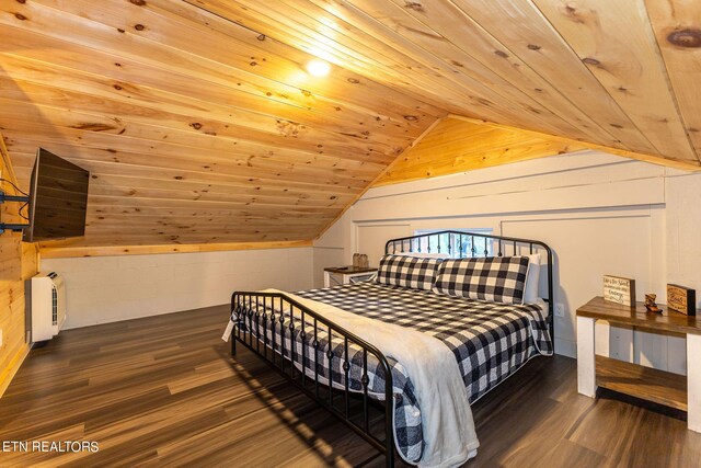 bedroom with dark hardwood / wood-style flooring and wood ceiling