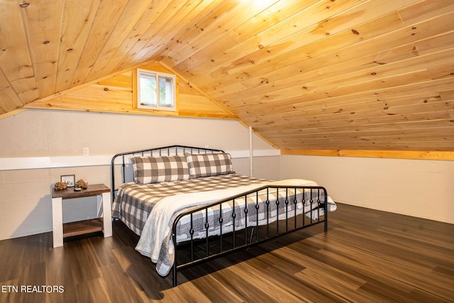 bedroom featuring dark wood-type flooring, wood ceiling, and lofted ceiling