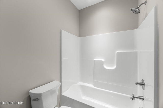 bathroom with toilet and shower / bathtub combination