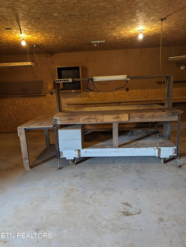 basement with a workshop area