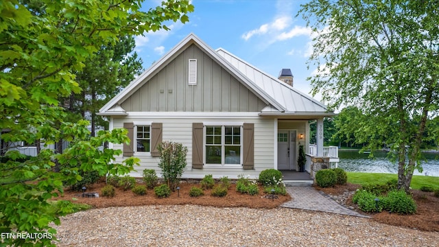 view of front of house featuring a water view