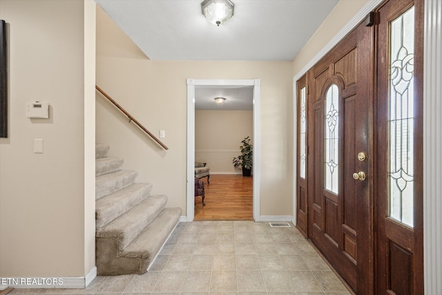 foyer entrance with a healthy amount of sunlight