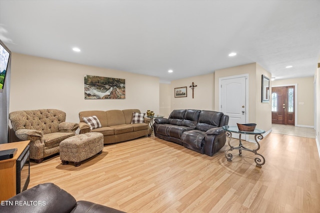 living room with light hardwood / wood-style floors