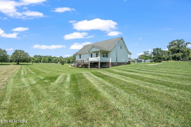 view of yard with a rural view