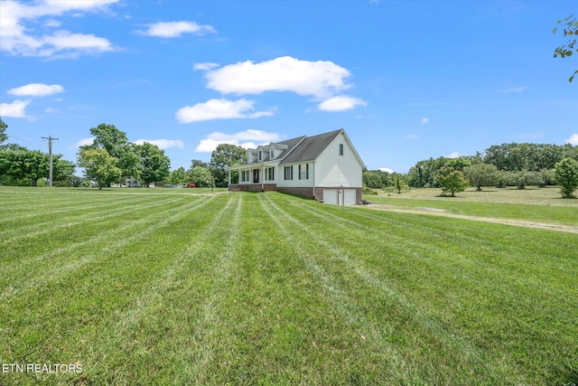 view of yard with a garage