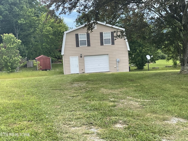 garage with a lawn