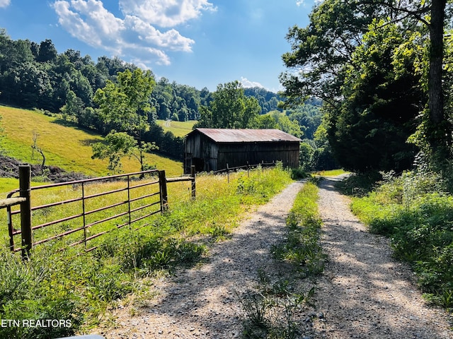 view of road with a rural view