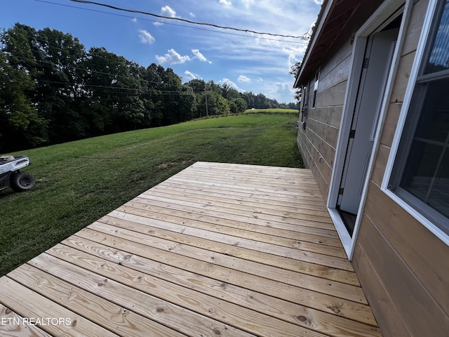 deck featuring a yard