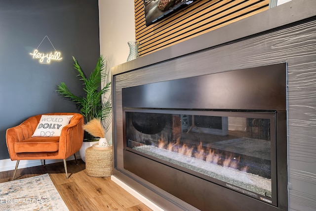 interior details featuring hardwood / wood-style flooring