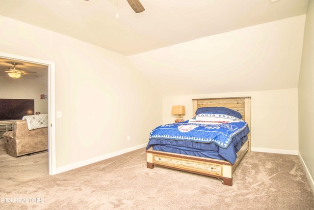 bedroom featuring ceiling fan, lofted ceiling, and carpet floors