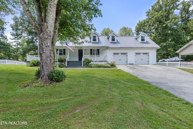 cape cod home with a front yard, a porch, and a garage