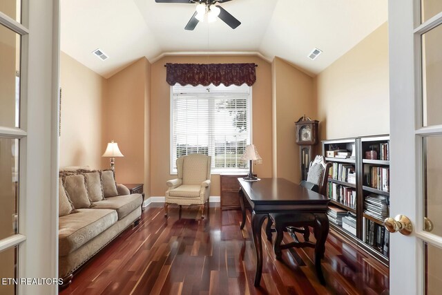 interior space with lofted ceiling, dark hardwood / wood-style floors, and ceiling fan