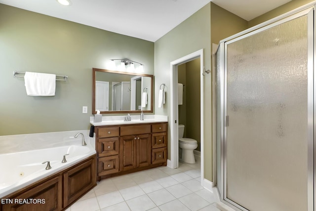 full bathroom with vanity, toilet, separate shower and tub, and tile patterned flooring