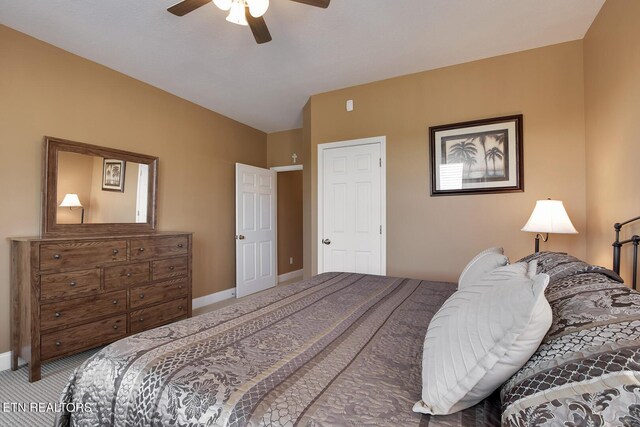 bedroom featuring ceiling fan and carpet floors