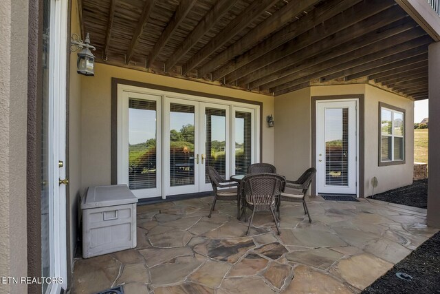 view of patio featuring french doors