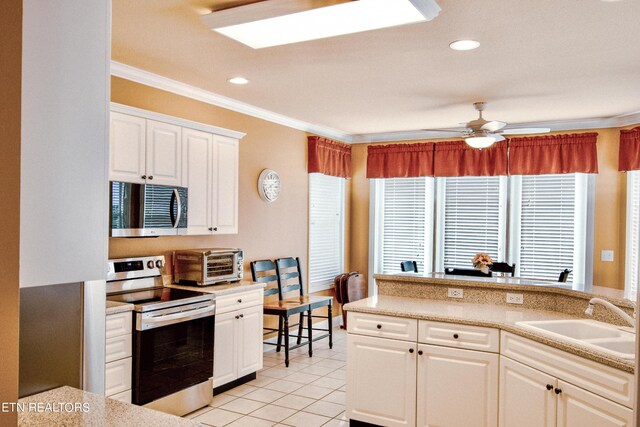 kitchen featuring sink, white cabinetry, light tile patterned floors, ornamental molding, and stainless steel appliances