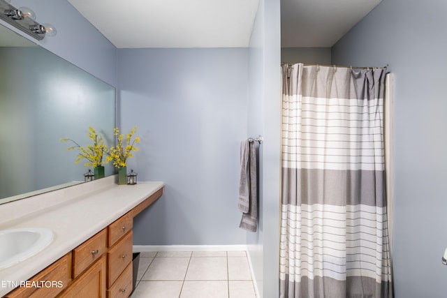 bathroom featuring tile patterned floors, curtained shower, and vanity