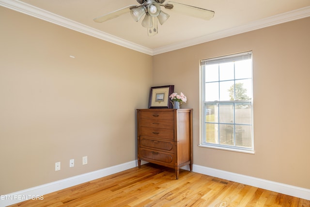 unfurnished room with ceiling fan, ornamental molding, and light hardwood / wood-style floors