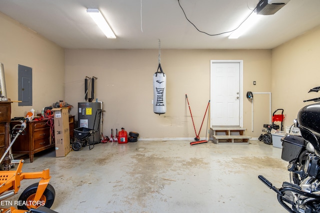 garage with a garage door opener, water heater, and electric panel