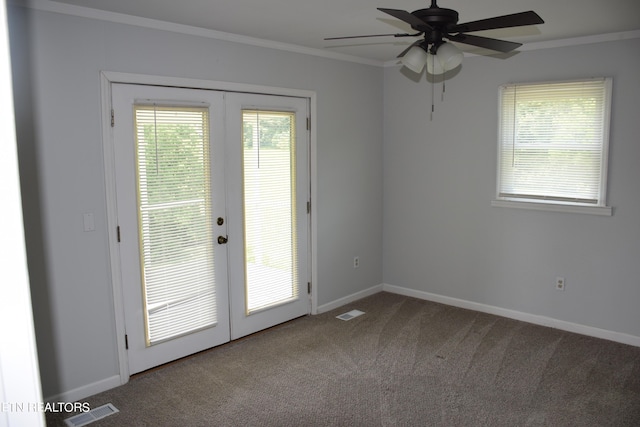 entryway featuring ceiling fan, french doors, carpet, and plenty of natural light