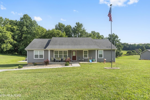 single story home featuring a front lawn and a porch