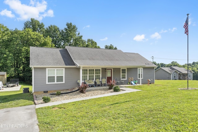 single story home with covered porch and a front yard