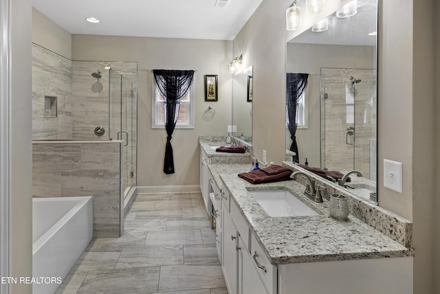 bathroom with vanity and plus walk in shower