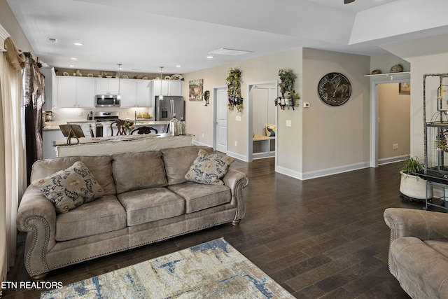 living room featuring dark hardwood / wood-style floors