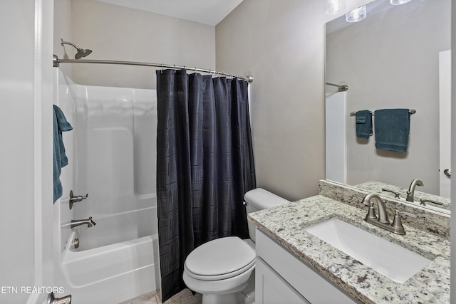 full bathroom featuring toilet, vanity, and shower / tub combo with curtain