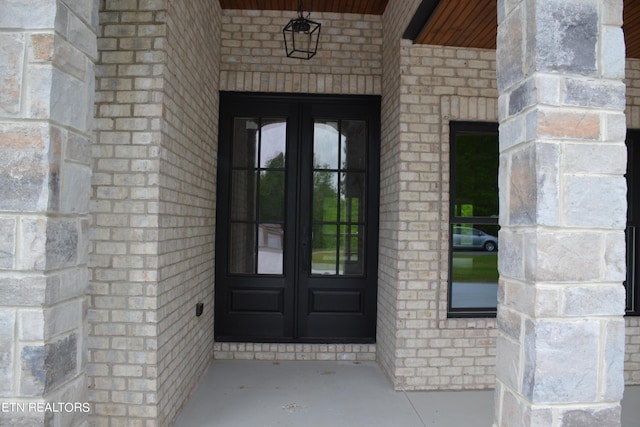 doorway to property featuring french doors