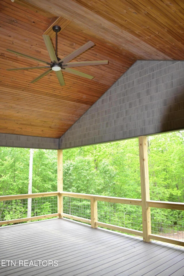 wooden terrace featuring ceiling fan