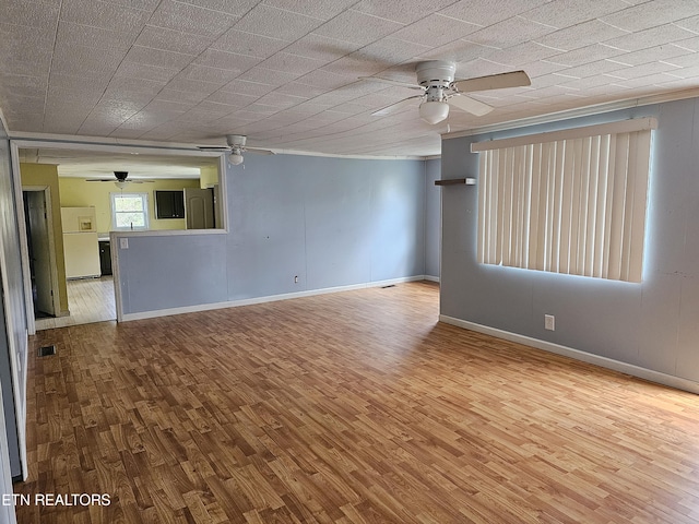 unfurnished room featuring light wood-type flooring