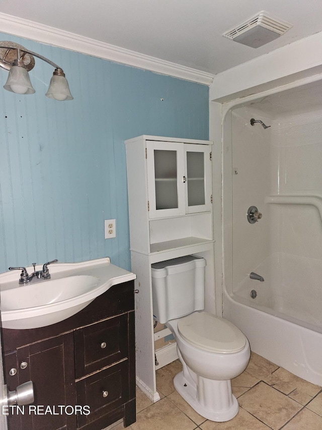 full bathroom featuring tile patterned flooring, vanity, toilet, ornamental molding, and shower / bathtub combination