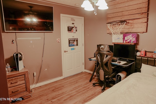 bedroom with hardwood / wood-style flooring