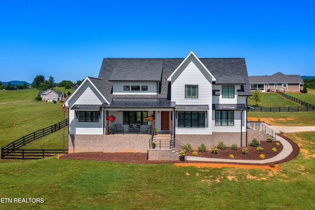 view of front of property with a front lawn