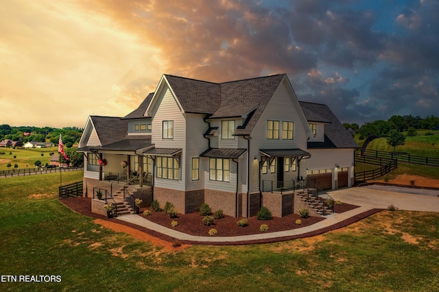 property exterior at dusk with a yard and a garage