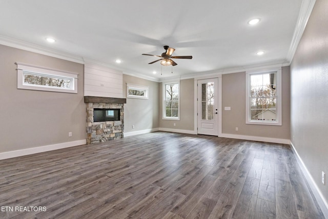 13 Norwich Ter, Fairfield Glade, TN 38558 - unfurnished living room featuring ornamental molding, a ceiling fan, a fireplace, recessed lighting, and dark wood-style flooring